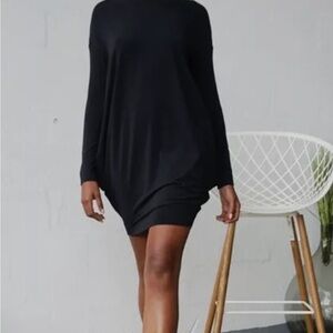 Little black dress by Marie St Pierre signature jersey, cocoon shape.